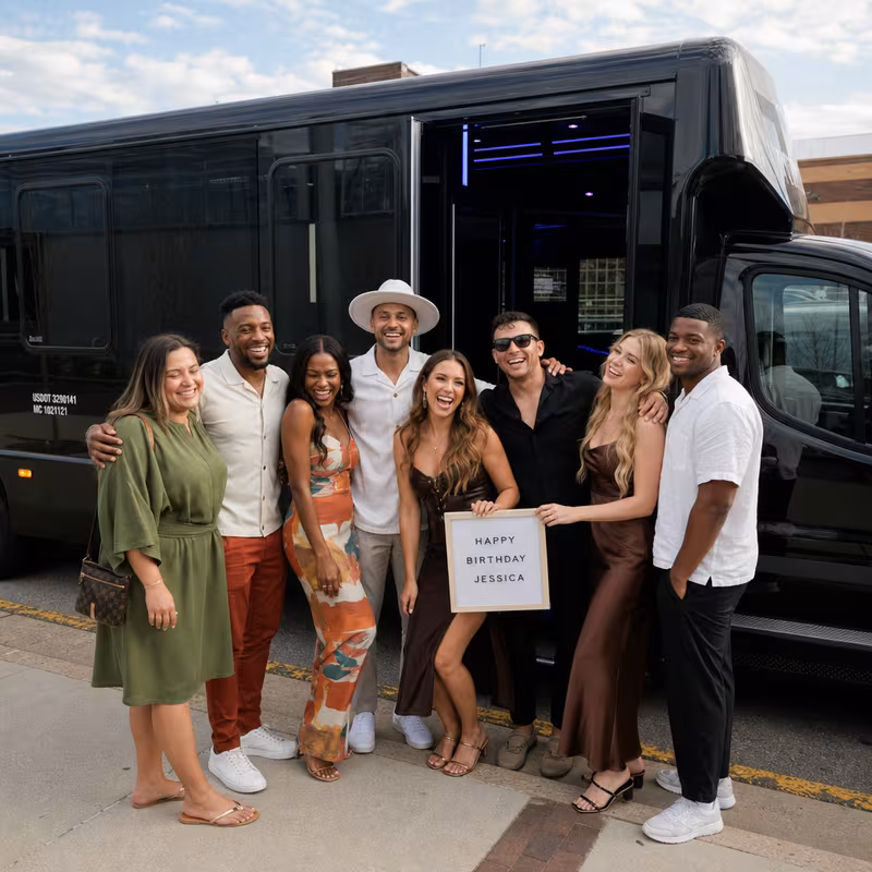 Group boarding a white charter bus for Birthday Transportation transportation in Fullerton