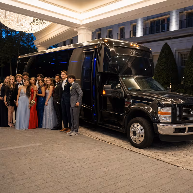 Party bus interior with wraparound leather seating and LED lighting in Fullerton