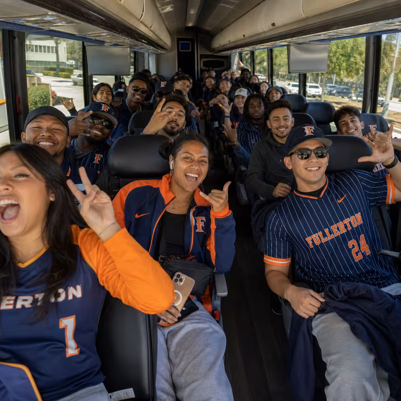 Black Mercedes Sprinter van staged for an Fullerton Sporting Event Transportation group